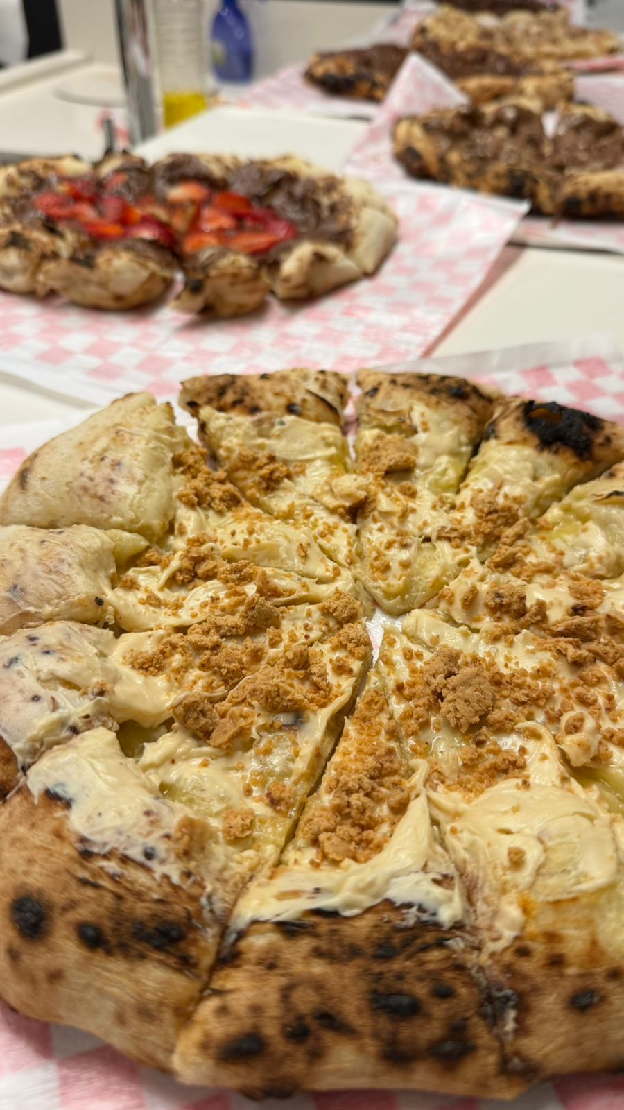 Pizza doce artesanal da Impasto di Larsen servida em evento